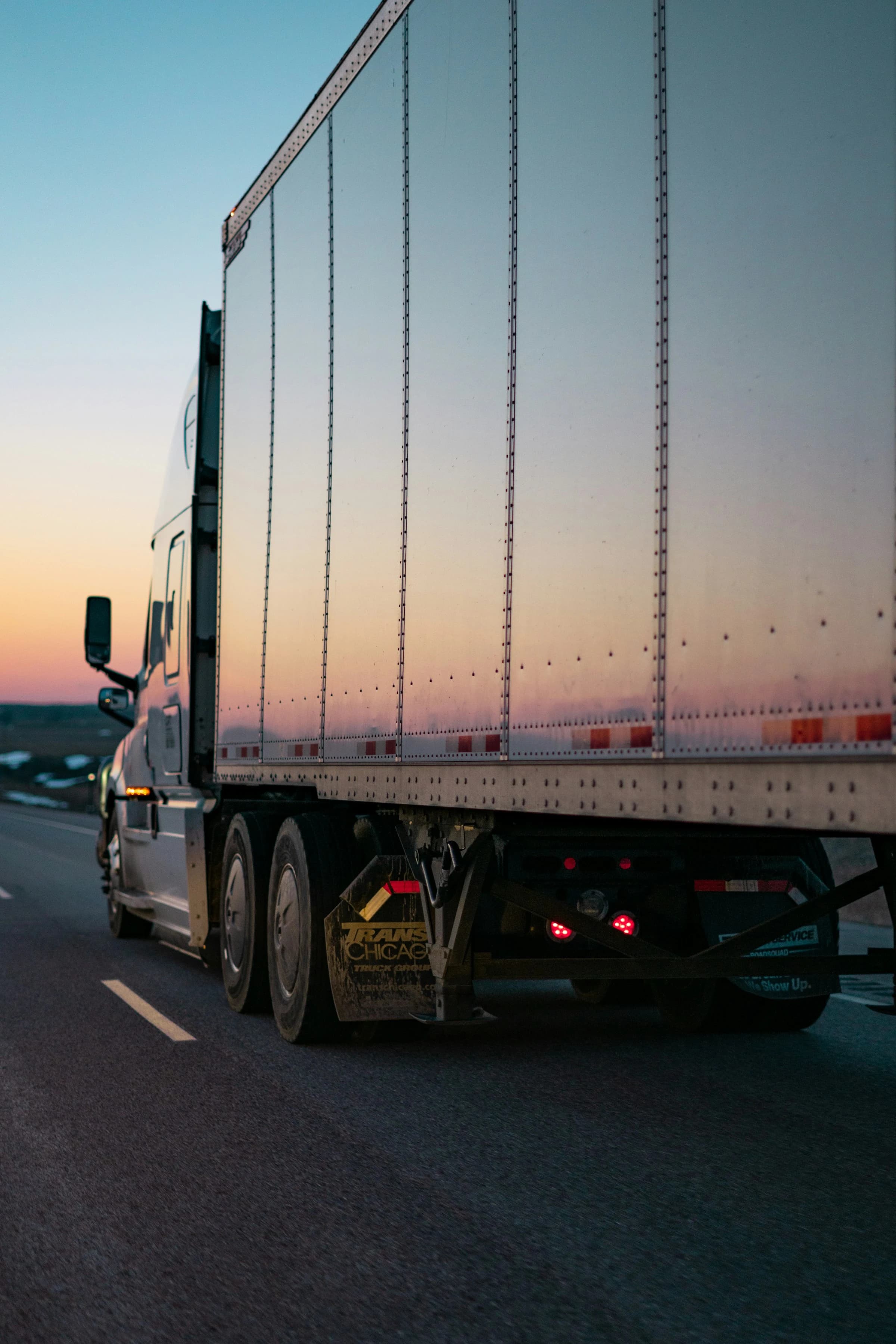 White freight truck at dusk